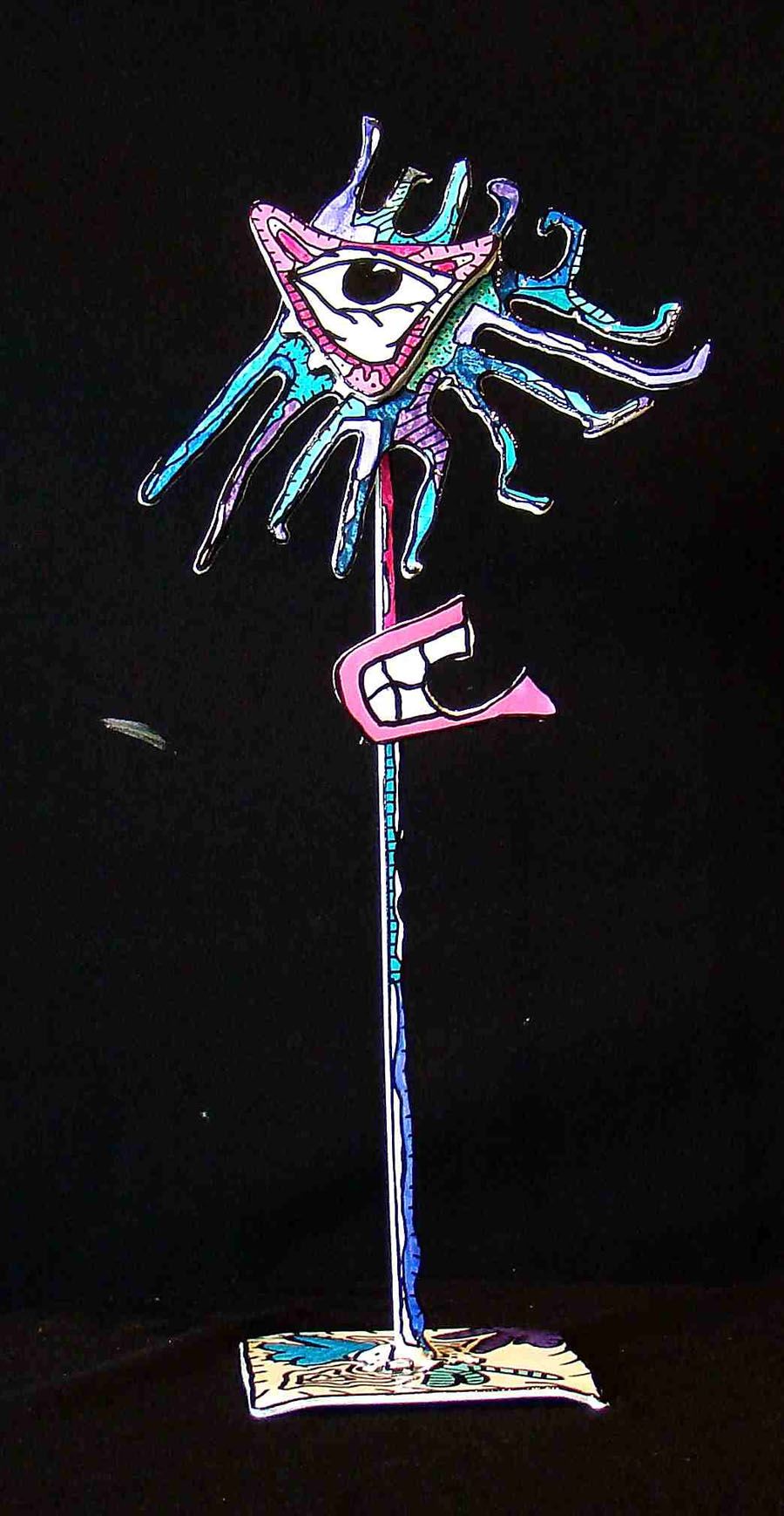 Sculpture de MICHADU a pour titre  SERIE MON OEIL style graphique dim : MICHADUprix:600